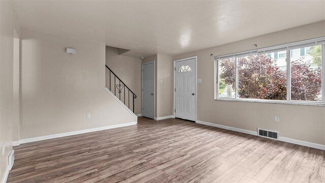150 Hawthorne, West View, PA 15229 - entrance foyer with wood finished floors, plenty of natural light, stairway, and baseboards