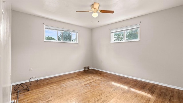 150 Hawthorne, West View, PA 15229 - spare room with wood finished floors, a ceiling fan, and baseboards