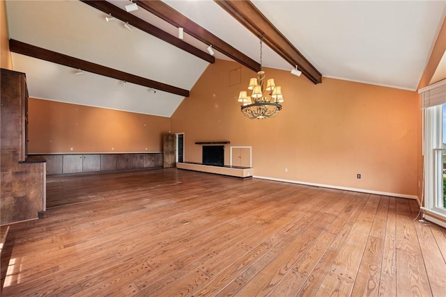 378 Stoneylonesome Rd, Cook Twp, PA 15687 - unfurnished living room featuring light wood-style flooring and a chandelier