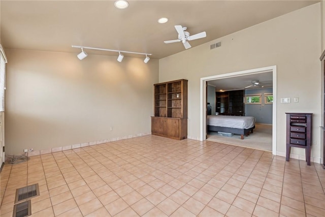 378 Stoneylonesome Rd, Cook Twp, PA 15687 - empty room featuring a ceiling fan, light tile patterned floors, rail lighting, and recessed lighting