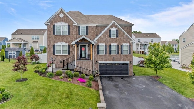 106 Fineview Cir, Brighton Twp, PA 15009 - view of front of home with an attached garage, brick siding, and driveway