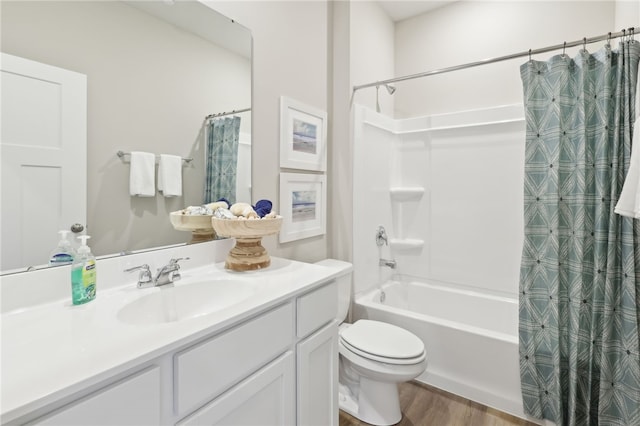 3045 Audrey Dr, Hempfield Twp, PA 15601 - full bath featuring shower / bath combo, vanity, and wood finished floors