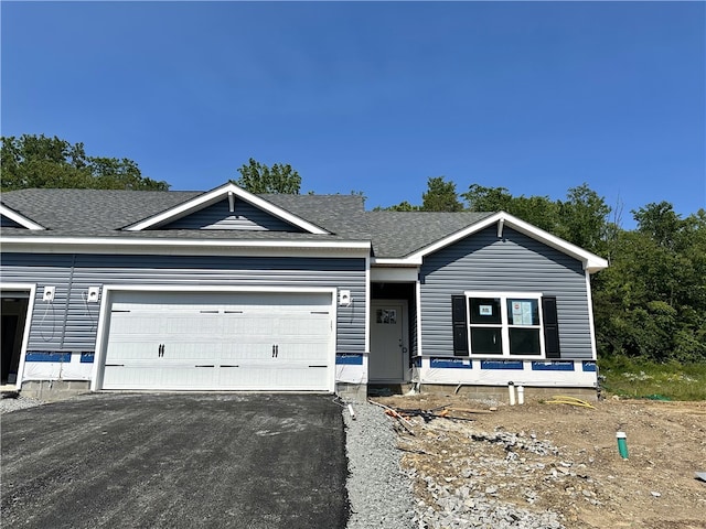 3045 Audrey Dr, Hempfield Twp Wml, PA 15601 - ranch-style house featuring a shingled roof, asphalt driveway, and a garage