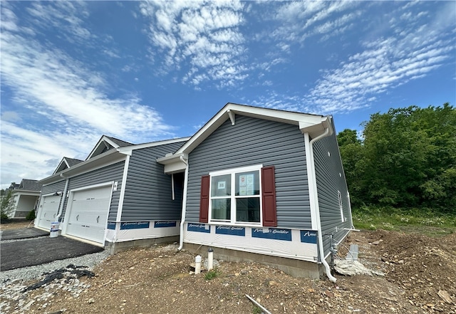 3045 Audrey Dr, Hempfield Twp, PA 15601 - view of front of home with a garage and driveway