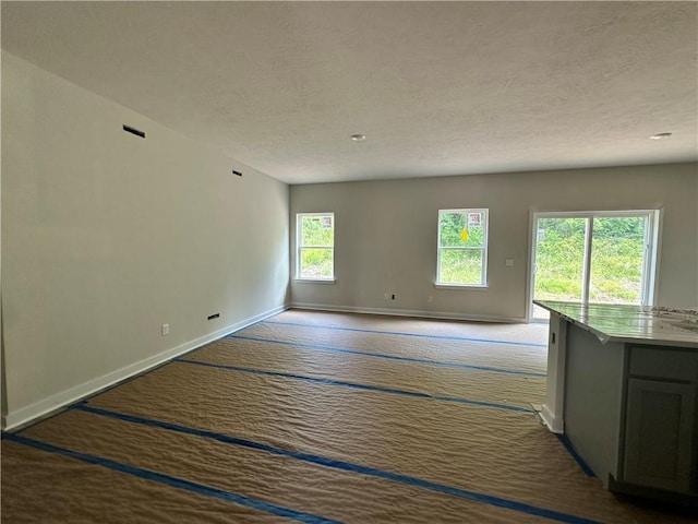 3045 Audrey Dr, Hempfield Twp, PA 15601 - empty room with a textured ceiling