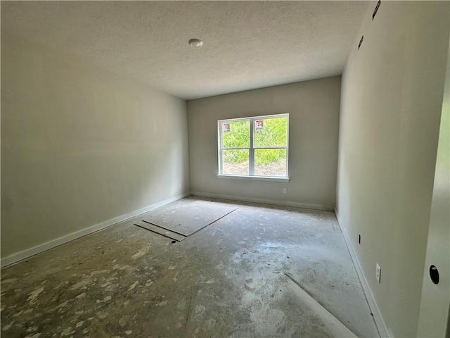 3045 Audrey Dr, Hempfield Twp, PA 15601 - empty room featuring a textured ceiling