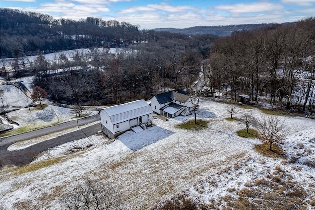 155 Old E Butler Rd, Summit Twp But, PA 16002 - snowy aerial view with a forest view