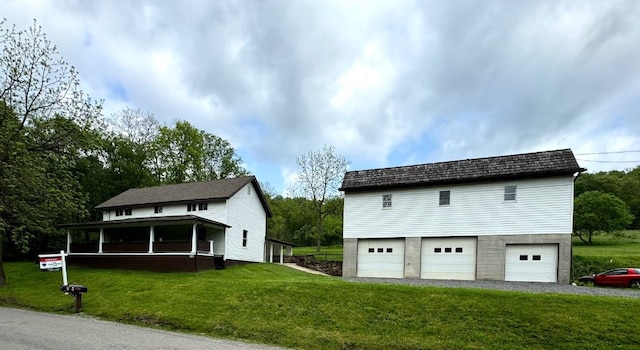 155 Old E Butler Rd, Summit Twp But, PA 16002 - view of front of house featuring a front lawn and a garage