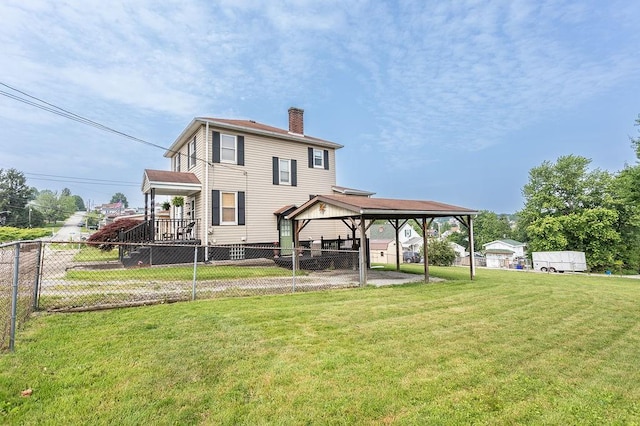 124 Clarendon Ave, South Union Twp, PA 15401 - rear view of property with a chimney and a gazebo
