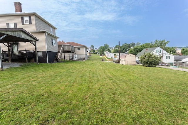 124 Clarendon Ave, South Union Twp, PA 15401 - view of yard featuring stairs, a wooden deck, and a residential view