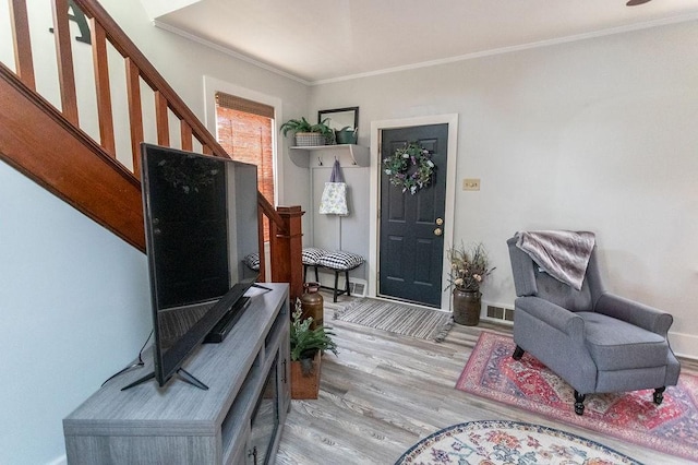 124 Clarendon Ave, South Union Twp, PA 15401 - sitting room with light wood-style floors, stairway, ornamental molding, and baseboards