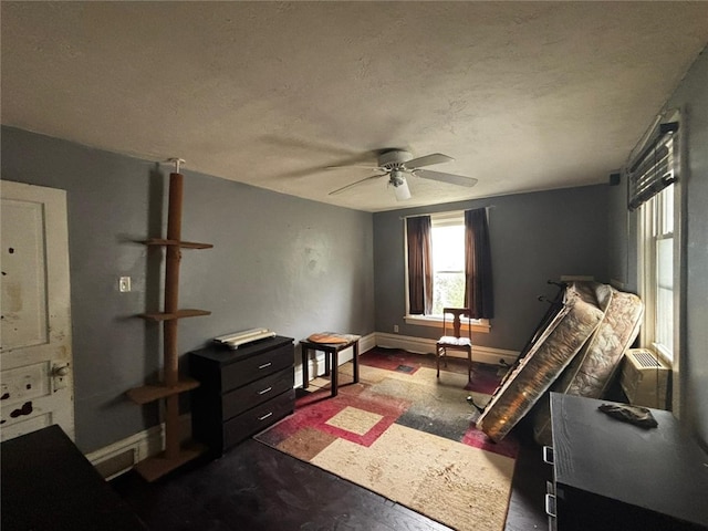 135 Hamilton Ave, Vandergrift Wml, PA 15690 - sitting room with ceiling fan, baseboards, and a textured ceiling