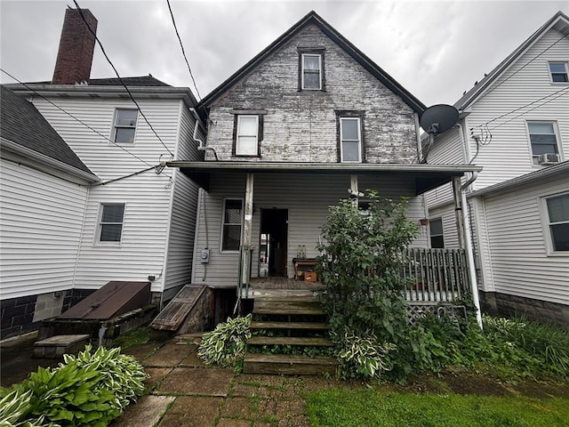 135 Hamilton Ave, Vandergrift Wml, PA 15690 - rear view of house featuring covered porch