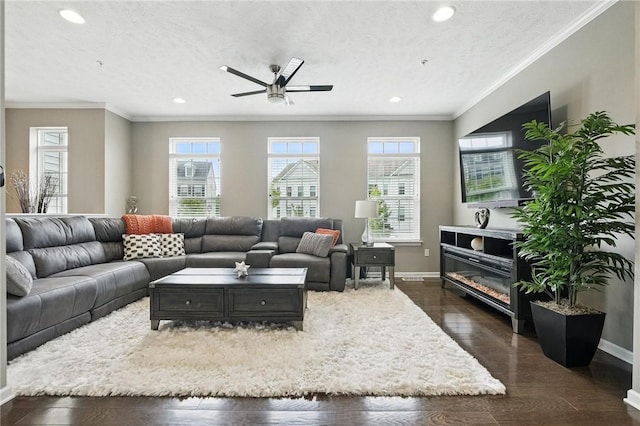 228 Eagle Dr, Cranberry Twp, PA 16066 - living room with ceiling fan, baseboards, recessed lighting, dark wood-style flooring, and ornamental molding