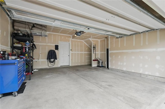 228 Eagle Dr, Cranberry Twp, PA 16066 - garage featuring a garage door opener