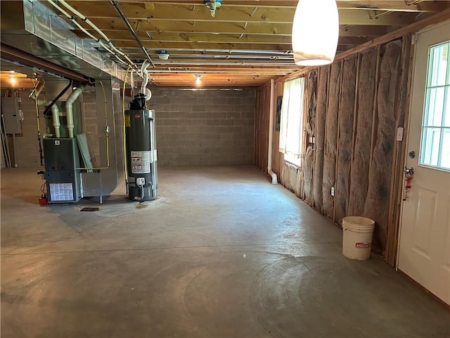 607 Crestview Ln, Lower Burrell, PA 15068 - below grade area with gas water heater, heating unit, concrete block wall, and electric panel