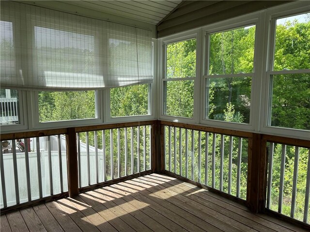 607 Crestview Ln, Lower Burrell, PA 15068 - unfurnished sunroom with lofted ceiling