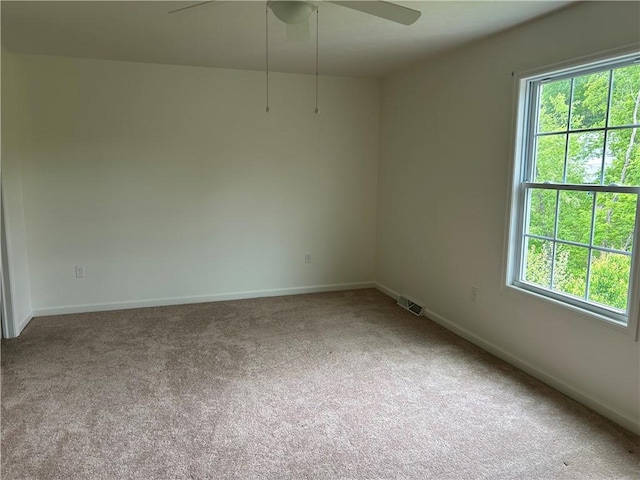 607 Crestview Ln, Lower Burrell, PA 15068 - carpeted spare room with plenty of natural light, ceiling fan, and baseboards