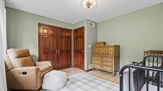 201 Clarke Rd, Buffalo Twp Wsh, PA 15323 - bedroom featuring light wood finished floors and a textured ceiling