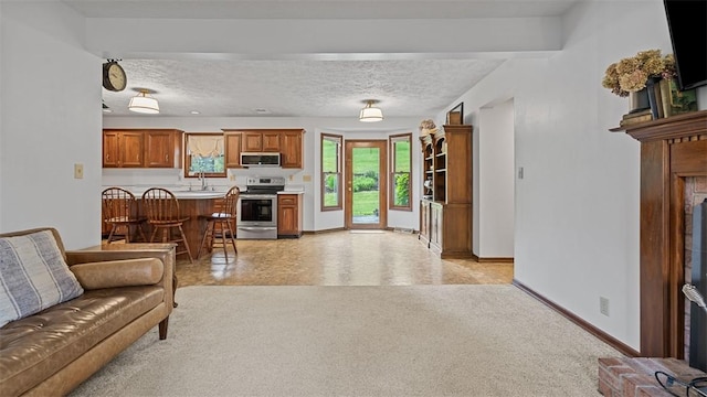 201 Clarke Rd, Buffalo Twp Wsh, PA 15323 - living area with baseboards, a textured ceiling, and light colored carpet
