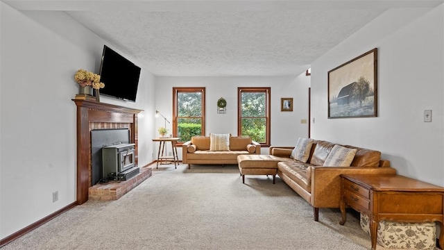 201 Clarke Rd, Buffalo Twp Wsh, PA 15323 - living area featuring a wood stove, carpet flooring, a textured ceiling, and baseboards