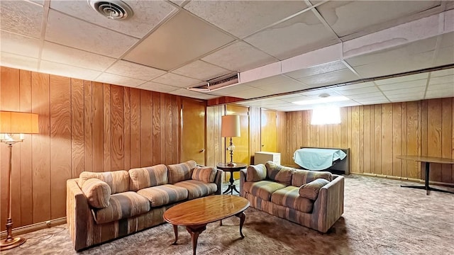131 E Fairmont Ave, New Castle/2Nd, PA 16105 - carpeted living room featuring wooden walls, a drop ceiling, and baseboards