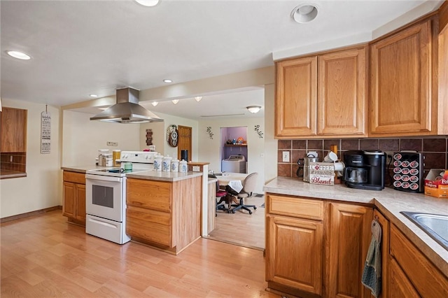 500 Kinsman Rd, Green Twp, PA 16134 - kitchen with extractor fan, white range with electric cooktop, light wood-style floors, decorative backsplash, and light countertops