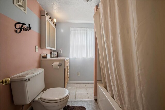 500 Kinsman Rd, Green Twp, PA 16134 - full bathroom featuring toilet, shower / bath combo, tile patterned flooring, a textured ceiling, and baseboards