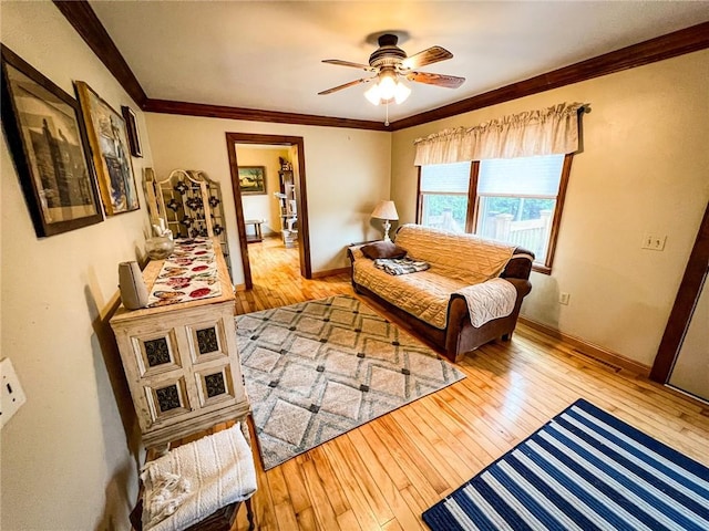 248 Jamisonville Rd, Center Twp But, PA 16001 - living area with light wood-style floors, a ceiling fan, crown molding, and baseboards