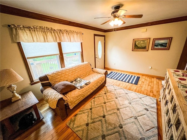 248 Jamisonville Rd, Center Twp But, PA 16001 - living room featuring hardwood / wood-style flooring, ceiling fan, baseboards, and crown molding