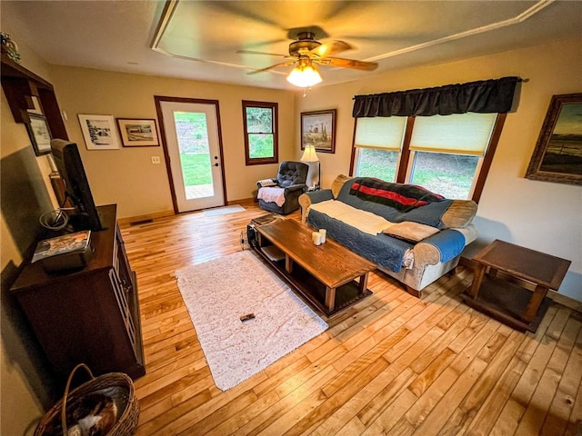 248 Jamisonville Rd, Center Twp But, PA 16001 - living room with light wood finished floors, ceiling fan, and baseboards