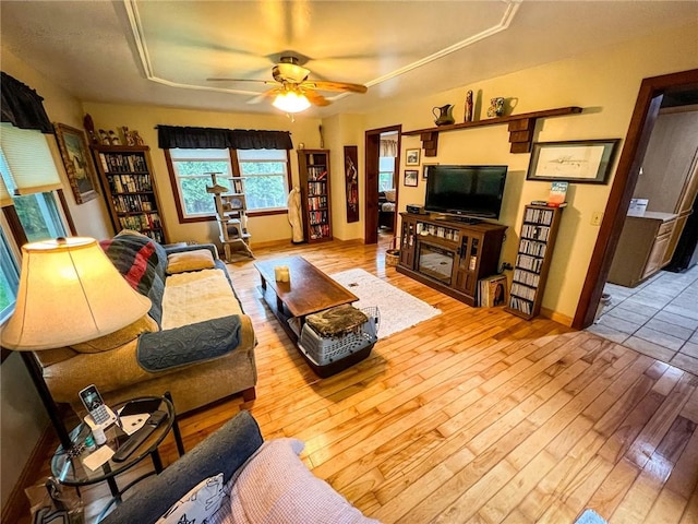 248 Jamisonville Rd, Center Twp But, PA 16001 - living room featuring hardwood / wood-style floors, ceiling fan, baseboards, and a tray ceiling