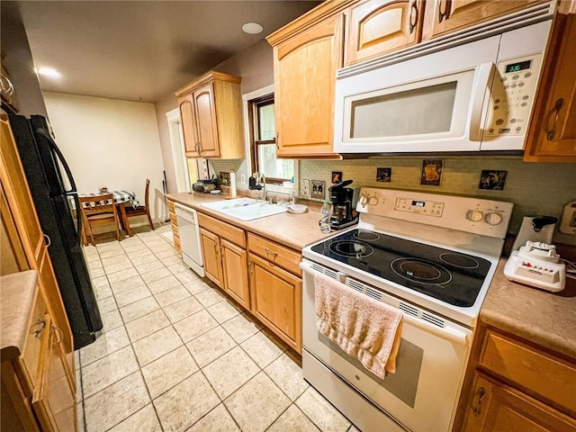 248 Jamisonville Rd, Center Twp But, PA 16001 - kitchen featuring white appliances, a sink, light countertops, and light tile patterned floors