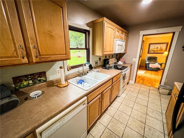 248 Jamisonville Rd, Center Twp But, PA 16001 - kitchen with white appliances, a sink, tasteful backsplash, light tile patterned floors, and recessed lighting