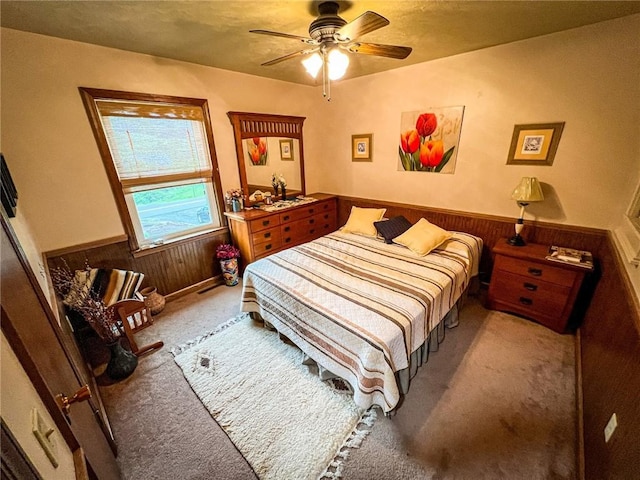 248 Jamisonville Rd, Center Twp But, PA 16001 - bedroom with carpet, a wainscoted wall, wood walls, and ceiling fan