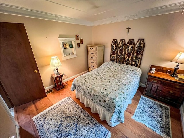 248 Jamisonville Rd, Center Twp But, PA 16001 - bedroom with wood finished floors, ornamental molding, and baseboards