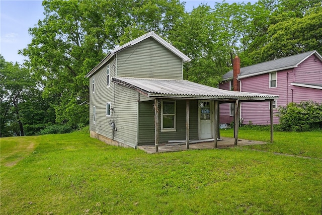 311 State Route 66, Leechburg Boro, PA 15656 - back of property featuring a lawn and metal roof
