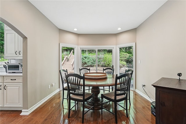 559 Normandy Ct, Fox Chapel, PA 15238 - dining space featuring wood finished floors, baseboards, arched walkways, and recessed lighting
