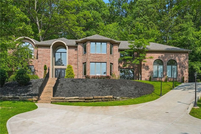 559 Normandy Ct, Fox Chapel, PA 15238 - view of front facade featuring brick siding and a shingled roof