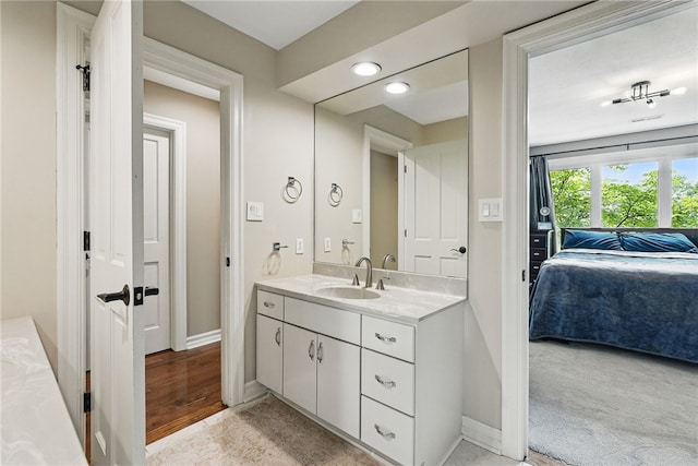 559 Normandy Ct, Fox Chapel, PA 15238 - bathroom with connected bathroom, vanity, and baseboards