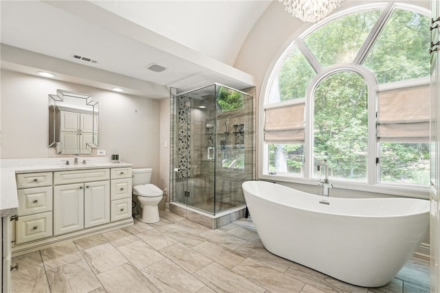559 Normandy Ct, Fox Chapel, PA 15238 - bathroom featuring a freestanding bath, vanity, a shower stall, toilet, and marble look tile flooring