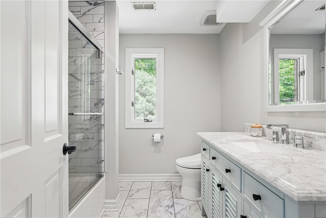 559 Normandy Ct, Fox Chapel, PA 15238 - bathroom featuring marble finish floors, healthy amount of natural light, vanity, and toilet