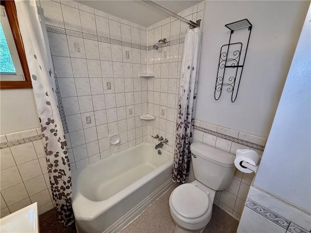 121-123 4th Ave, Scottdale, PA 15683 - full bath featuring tile walls, shower / bath combo, toilet, and a wainscoted wall
