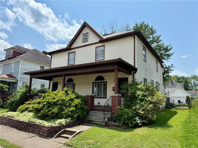 121-123 4th Ave, Scottdale, PA 15683 - traditional style home featuring a front yard and a porch