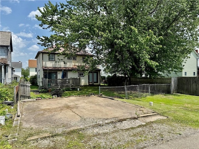 121-123 4th Ave, Scottdale, PA 15683 - rear view of house with a wooden deck