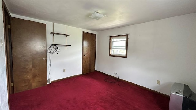 820-822 Main St, Springdale Twp, PA 15049 - unfurnished bedroom with dark carpet and baseboards