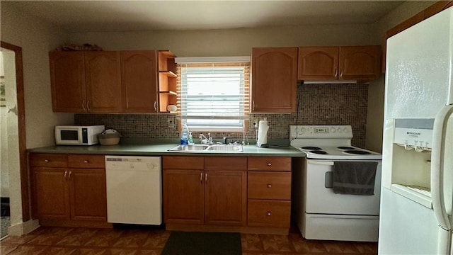 820-822 Main St, Springdale Twp, PA 15049 - kitchen featuring white appliances, a sink, decorative backsplash, and light countertops