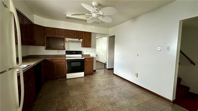 820-822 Main St, Springdale Twp, PA 15049 - kitchen with electric range, under cabinet range hood, freestanding refrigerator, ceiling fan, and baseboards