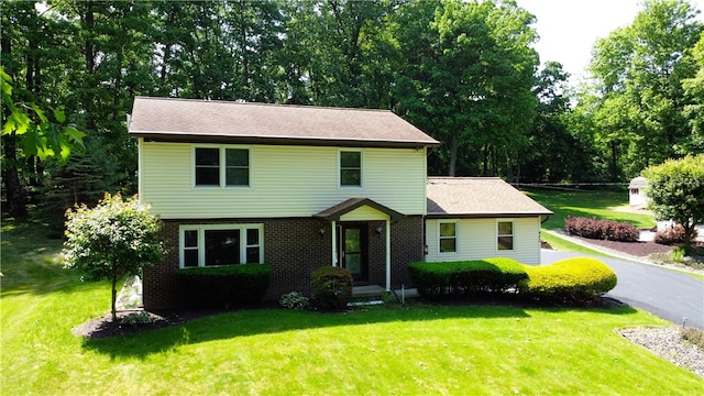 452 Cherokee Dr, Center Twp But, PA 16001 - view of front of property featuring a front yard and brick siding