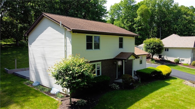 452 Cherokee Dr, Center Twp But, PA 16001 - view of front of property with a front lawn and a shingled roof